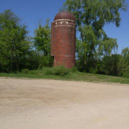 Old silo in parking lot. Old silo in parking lot.