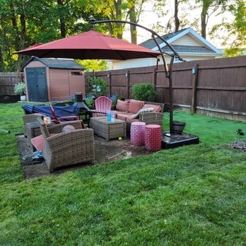 Scenic View Landscaping & Design Specialist - a patio area with furniture and umbrella - Landscaping Near Me - Keyport, New Jersey