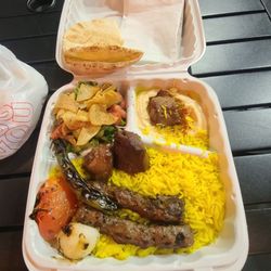 Half kafta, half steak kabob platter that comes with saffron rice, hummus, pita bread & a side salad with a dressing to die for!