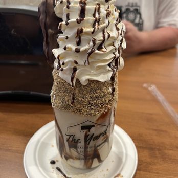 The Yard Milkshake Bar - Creamy Carmel S'mores milkshake - Ice Cream & Frozen Yogurt Near Me - Pigeon Forge, Tennessee The Yard Milkshake Bar - Creamy Carmel S'mores milkshake - Ice Cream & Frozen Yogurt Near Me - Pigeon Forge, Tennessee