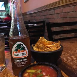 Tamarind Jarrtitos soda with complimentary chips & salsa Tamarind Jarrtitos soda with complimentary chips & salsa