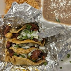 La Salsa Loca Tacos and More - Taco plate de trompo