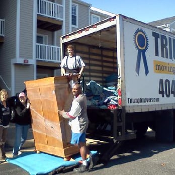 Triumph Moving & Storage - Triumph Movers prepares this armoire for its accent to the 3rd floor of this apartment building! - Movers Near Me - Norfolk, Virginia Triumph Moving & Storage - Triumph Movers prepares this armoire for its accent to the 3rd floor of this apartment building! - Movers Near Me - Norfolk, Virginia