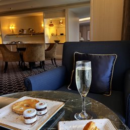 Checked in & waiting for the room w/ complimentary Prosecco & snacks Checked in & waiting for the room w/ complimentary Prosecco & snacks