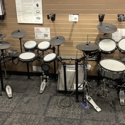 Drum sets, none of which having thrones (or sticks) and none of which being set up at all. Drum sets, none of which having thrones (or sticks) and none of which being set up at all.