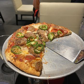 Fillmore Pizza Kitchen - Smelled so good we started taking slices before I took the photo. - Pizza Near Me - Colorado Springs, Colorado Fillmore Pizza Kitchen - Smelled so good we started taking slices before I took the photo. - Pizza Near Me - Colorado Springs, Colorado