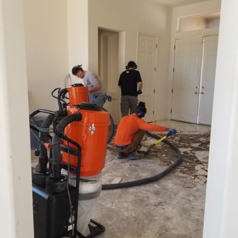 Mission Demolition Floor Removal - Hard at work! - Demolition Services Near Me