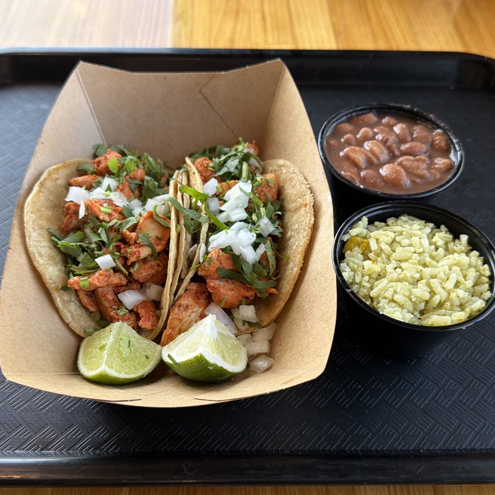 TNT's Tacos N' Tortas - Taco Tuesday Special - Two 4.5" Double Tortilla Tacos with Choice of Two Sides for $9.99 - Pollo Tacos Shown - Mexican Near Me - Olathe, Kansas TNT's Tacos N' Tortas - Taco Tuesday Special - Two 4.5" Double Tortilla Tacos with Choice of Two Sides for $9.99 - Pollo Tacos Shown - Mexican Near Me - Olathe, Kansas