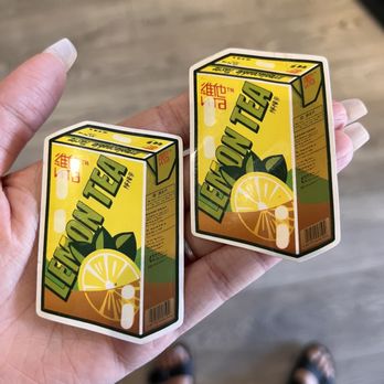 Medella Boba - a hand holding two cartons of juice - Bubble Tea Near Me - Downey, California Medella Boba - a hand holding two cartons of juice - Bubble Tea Near Me - Downey, California