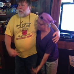 Elvoy Tavern - The owner (in yellow)