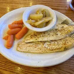 Cracker Barrel Old Country Store - Grilled Catfish with two classic sides; whole baby carrots and Fried Cinnamon Apples. The meal is actually pretty good.