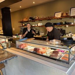 Sushi is crafted by experts at the sushi bar Sushi is crafted by experts at the sushi bar