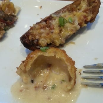 Sporting Life Bar - Burnt potato skin and weird liquid cheese ball - Sports Bars Near Me - Las Vegas, Nevada Sporting Life Bar - Burnt potato skin and weird liquid cheese ball - Sports Bars Near Me - Las Vegas, Nevada