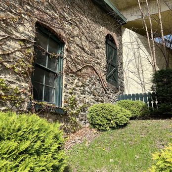 Pleasant Valley Wine Company - a brick building with vines growing on the side of the building - Wineries Near Me - Hammondsport, New York Pleasant Valley Wine Company - a brick building with vines growing on the side of the building - Wineries Near Me - Hammondsport, New York