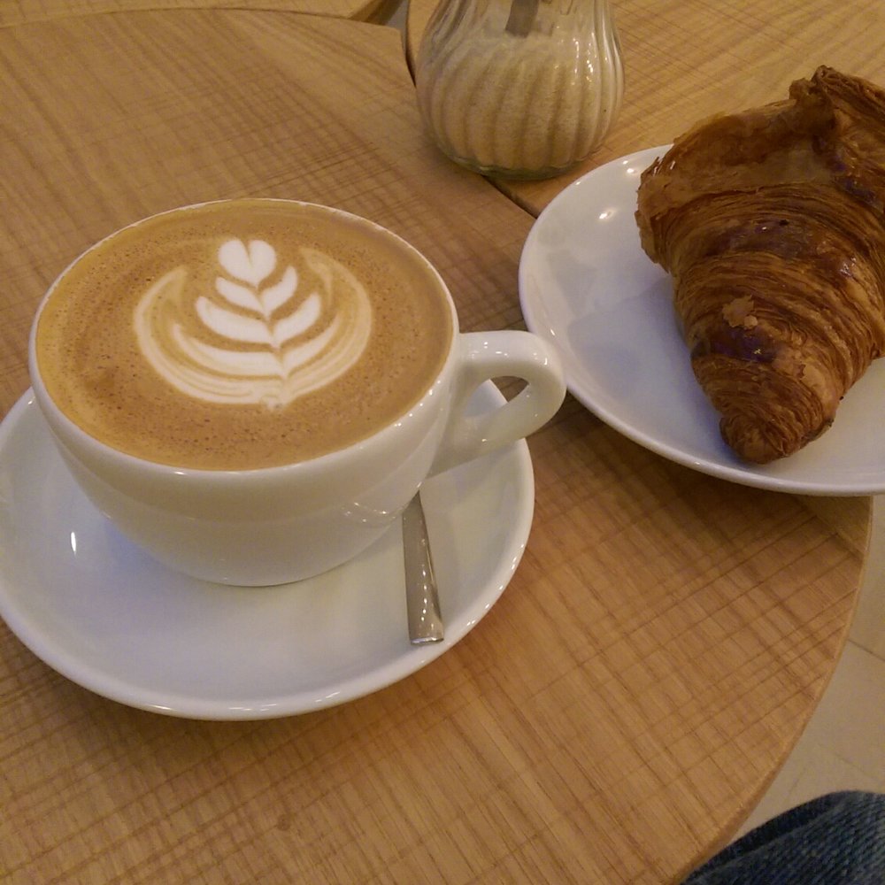 Large cappuccino and plain croissant Large cappuccino and plain croissant