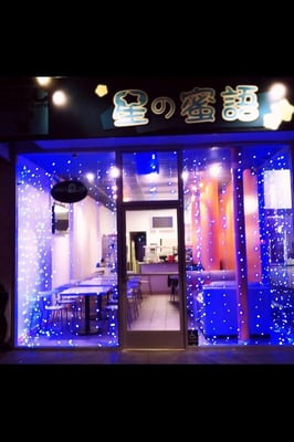 Photo of ETC Dessert Cafe - San Francisco, CA, US. Beautiful blue lights hanging from the ceiling, covering the entire window