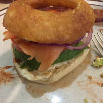 Lily's Cafe - Omg the best!!! Smoked salmon on bagel with cream cheese and slice of avocado and red onion side of  onion rings to sandwich it in. - American Near Me - Newhall, California