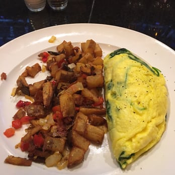 George Martin's Grillfire - 3 egg omelet with spinach and crab imperial, accompanied by home fries - Steakhouses Near Me - Hanover, Maryland George Martin's Grillfire - 3 egg omelet with spinach and crab imperial, accompanied by home fries - Steakhouses Near Me - Hanover, Maryland