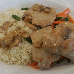Saute Pork with rice pilaf and veggies