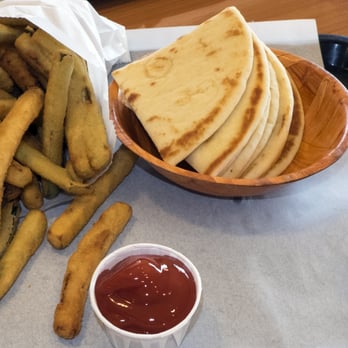 Greek Chicken - Zucchini and pita bread - Greek Near Me - Lakeside, California Greek Chicken - Zucchini and pita bread - Greek Near Me - Lakeside, California