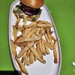 Crispy chicken sandwich and fries. Crispy chicken sandwich and fries.