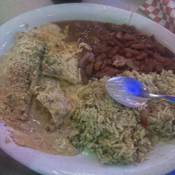 Bucky Moonshine's - Crawfish Enchiladas with "dirty rice" - Cajun/Creole Near Me - Dallas, Texas Bucky Moonshine's - Crawfish Enchiladas with "dirty rice" - Cajun/Creole Near Me - Dallas, Texas