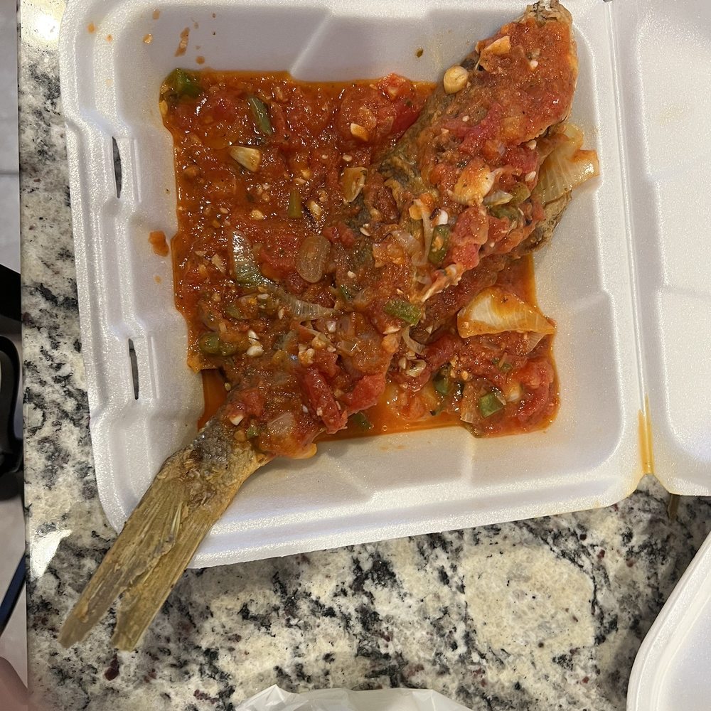 Fried snapper over delicious sauce Fried snapper over delicious sauce