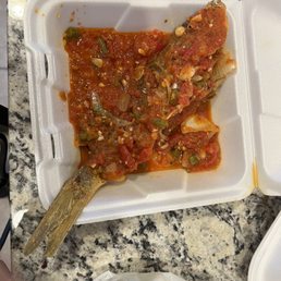 Fried snapper over delicious sauce