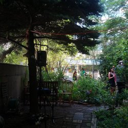 Alice's Garden - A musician was setting up to play.