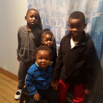 Brooklyn Children's Museum - The kids posing with the New Year background. - Children's Museums Near Me - Brooklyn, New York Brooklyn Children's Museum - The kids posing with the New Year background. - Children's Museums Near Me - Brooklyn, New York