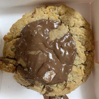 Crumbl - Cerritos - Peanut butter cookie with chocolate on top. It looks funny because it was upside down - Bakeries Near Me - Cerritos, California Crumbl - Cerritos - Peanut butter cookie with chocolate on top. It looks funny because it was upside down - Bakeries Near Me - Cerritos, California
