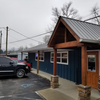 G&E Burgers - a man standing outside of a restaurant - Burgers Near Me - Williamsburg, Kentucky G&E Burgers - a man standing outside of a restaurant - Burgers Near Me - Williamsburg, Kentucky