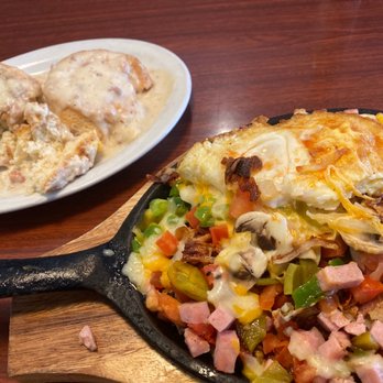 Corky's Kitchen & Bakery - Hobo Skillet: Hash Brown w/ bell peppers, onions, ham, bacon, mushroom n cheese. This is super filling, can easily feed 2-peep!! - Bakeries Near Me - Fontana, California Corky's Kitchen & Bakery - Hobo Skillet: Hash Brown w/ bell peppers, onions, ham, bacon, mushroom n cheese. This is super filling, can easily feed 2-peep!! - Bakeries Near Me - Fontana, California