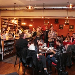 Locomotive Espresso - Espresso bar interior with art by Romney D. Smith