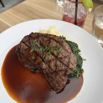 Napkins - Grilled ribeye mashed potatoes, sautéed spinach, garlic, and bordelaise sauce. - New American Near Me - Napa, California Napkins - Grilled ribeye mashed potatoes, sautéed spinach, garlic, and bordelaise sauce. - New American Near Me - Napa, California