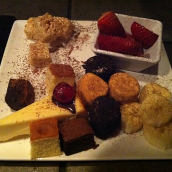 The Melting Pot - Dippers: Strawberries, Blondies, Bananas, Pineapple, Cheesecake, Rice Krispies, Marshmallows, Pound Cake and Brownies - Fondue Near Me - Arlington, Virginia The Melting Pot - Dippers: Strawberries, Blondies, Bananas, Pineapple, Cheesecake, Rice Krispies, Marshmallows, Pound Cake and Brownies - Fondue Near Me - Arlington, Virginia