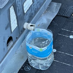 North Oak Real Estate Investments - North Oak allowed an ac unit to leak and destroy multiple ceilings. They contain leaks with cut open water bottles.