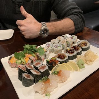 Rocky Yama Sushi - From back left going clockwise: Fire Cracker Roll, Yellowtail Roll, Unagi Roll, 2 Piece Tai sushi, and Spicy Tuna Roll - Japanese Near Me - Denver, Colorado Rocky Yama Sushi - From back left going clockwise: Fire Cracker Roll, Yellowtail Roll, Unagi Roll, 2 Piece Tai sushi, and Spicy Tuna Roll - Japanese Near Me - Denver, Colorado