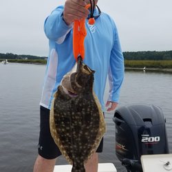 Strange Magic Fishing Charters - a 24" flounder - lots of good meat to eat!