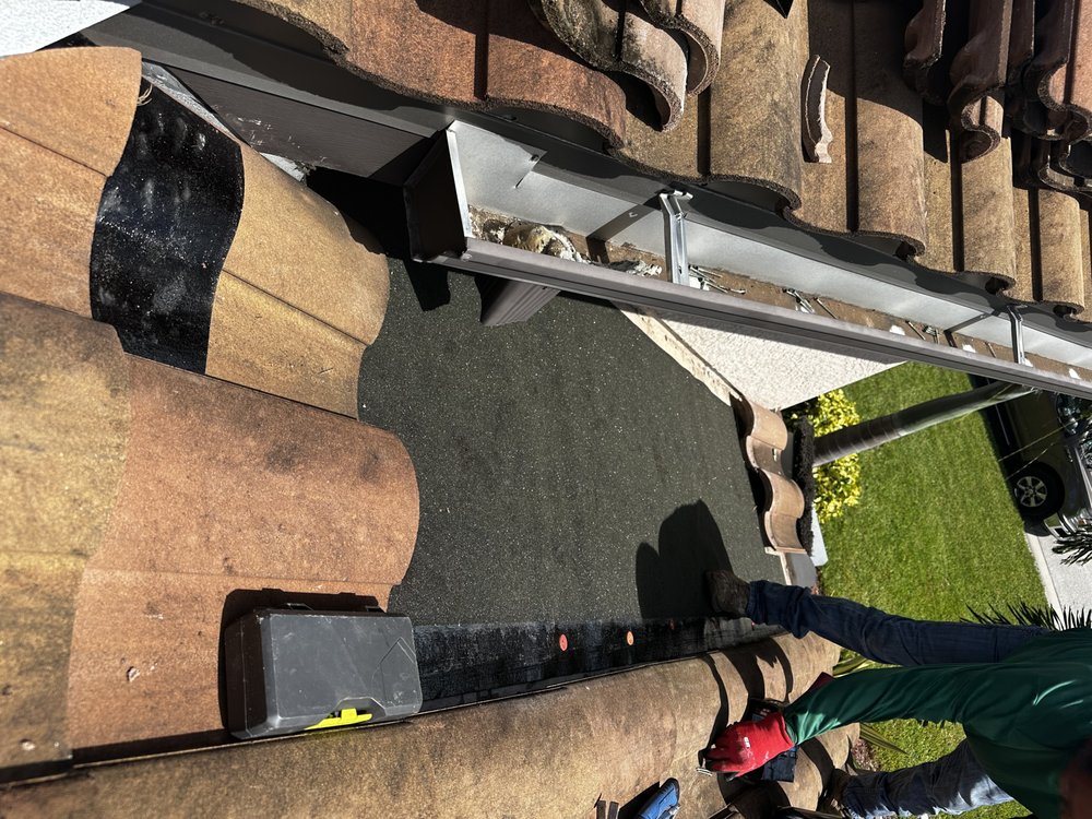 Slide of Tropical Roofing Services