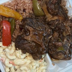 Oxtail, macaroni salad, rice and beans