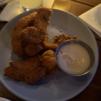 Earls Kitchen + Bar - Chicken tenders appetizers. Some may have already been eaten! - Cocktail Bars Near Me - Honolulu, Hawaii Earls Kitchen + Bar - Chicken tenders appetizers. Some may have already been eaten! - Cocktail Bars Near Me - Honolulu, Hawaii