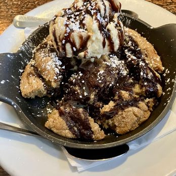Hearth and Tap - Chocolate chip cookie skillet with ice cream and syrup - Gastropubs Near Me - Montvale, New Jersey Hearth and Tap - Chocolate chip cookie skillet with ice cream and syrup - Gastropubs Near Me - Montvale, New Jersey