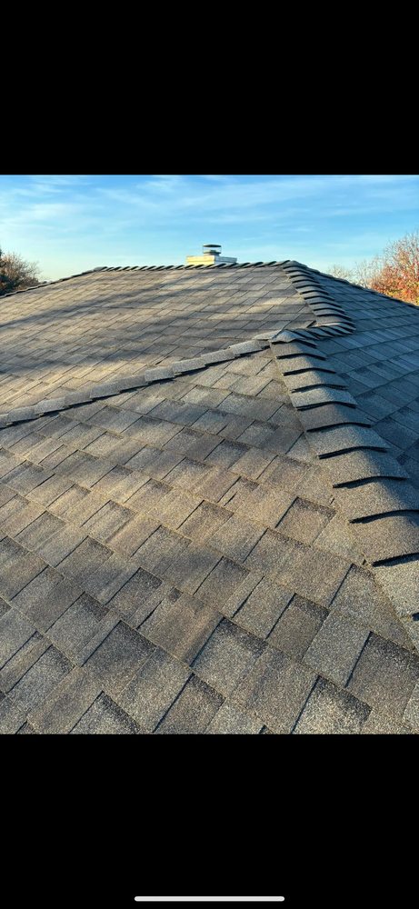 Slide of AM Quality Roofing and Construction