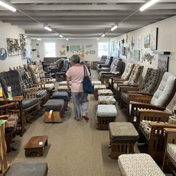 Treasures Forever - The chair and ottoman floor plus art items on the walls