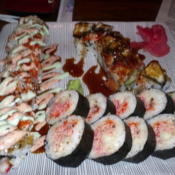 Sushi Thai Restaurant - Lobster roll on far left, spicy crab roll in the middle, Eel roll back right. - Sushi Bars Near Me - Warner Robins, Georgia Sushi Thai Restaurant - Lobster roll on far left, spicy crab roll in the middle, Eel roll back right. - Sushi Bars Near Me - Warner Robins, Georgia
