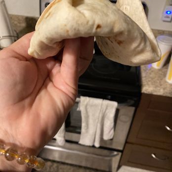 Taco Bell - Nasty Crunchwrap supreme! Soggy 5 minutes after buying it. - Fast Food Near Me - Honolulu, Hawaii