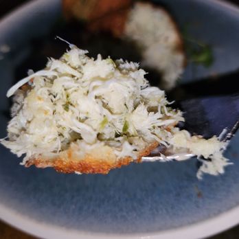 1 Pico - Up close to a bite of the crab croquettes from 1 Pico - New American Near Me - Santa Monica, California