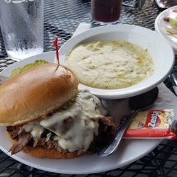 My way over cooked Prime Burger. I didn't enjoy it but the flies certainly seemed to love it (along with everything else on the table). My way over cooked Prime Burger. I didn't enjoy it but the flies certainly seemed to love it (along with everything else on the table).
