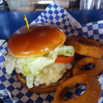 The Scoreboard - One of the BEST burgers ever. Cheese, lettuce, tomato and avocado and onion rings. - Sports Bars Near Me - Imperial Beach, California